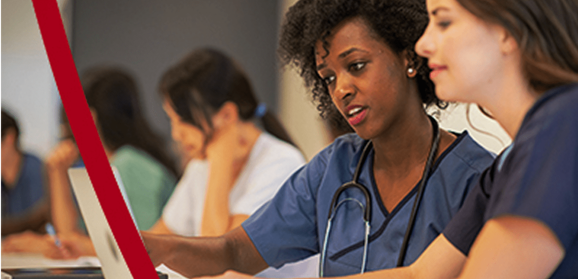 A group of healthcare professionals collaborate in a learning environment.